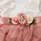 blush flower girl dress in a tiered sleeveless tutu style. In lace and tulle. 