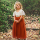 burnt orange flower girl dress with lace and tulle.