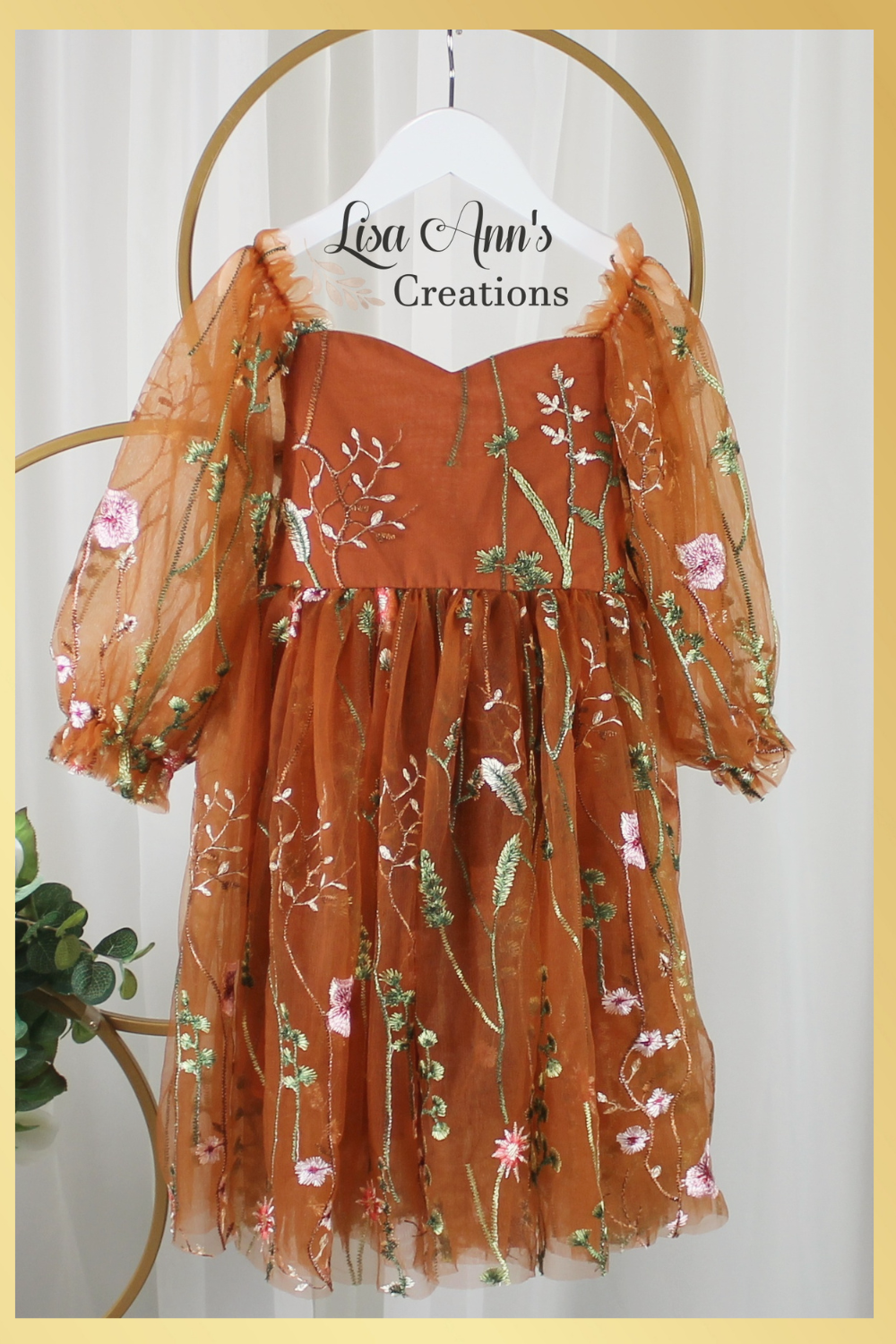 Burnt Orange Floral girls dress long tulle sleeves and knee length style. 