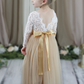 Champagne flower girl dress with full length tulle and white lace long sleeve bodice 