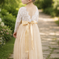toddler flower girl dress in champagne tulle and white lace long sleeves. 