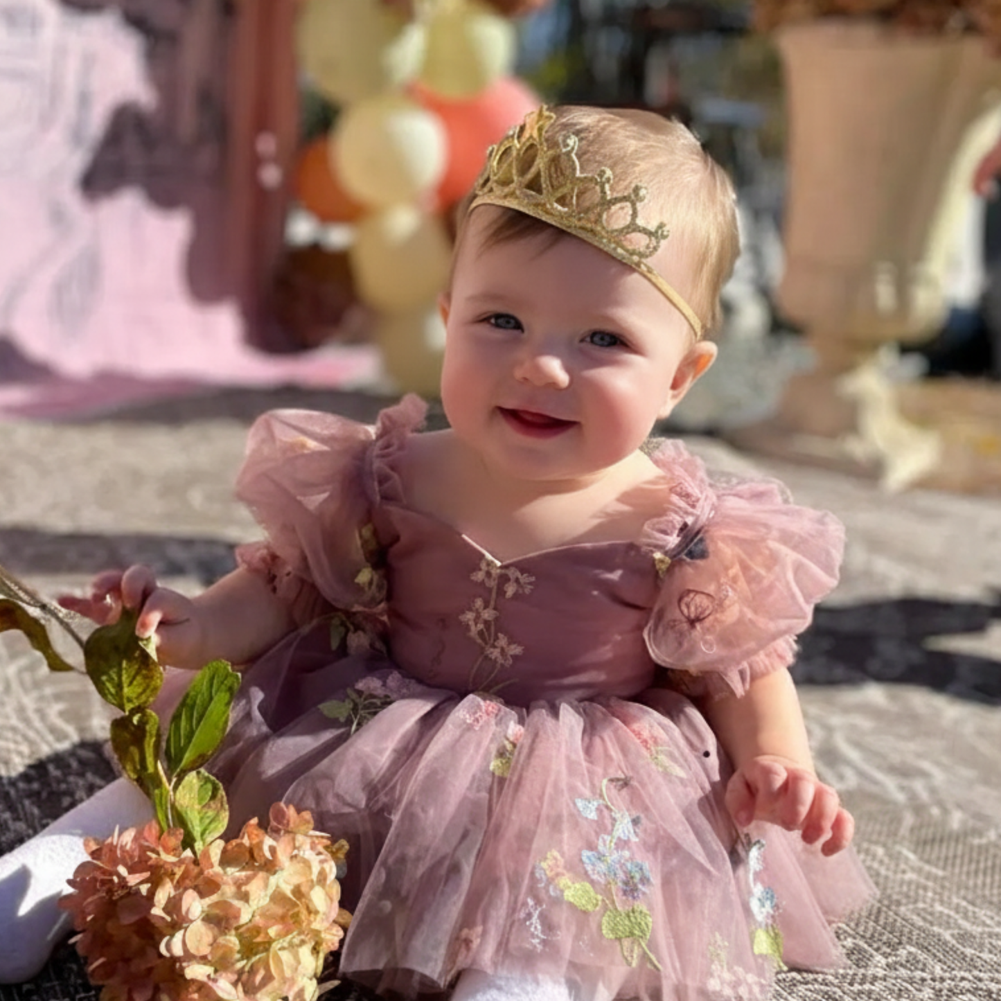Baby Girl first birthday dress in dusty purple floral embroidery flowers for fairy and wildflower and fairy birthday parties. 