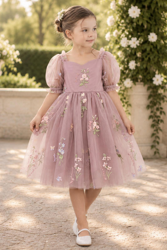 floral flower girl dress in embroidered floral ivory tulle and big puffy sleeves.  