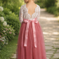 Flower girl dress in dusty rose tulle. lace long sleeves and ankle length dress tyle. 