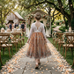 Burnt Orange Floral flower girl dress in long sleeve white lace with full length tulle bottom. 