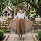 Burnt Orange Floral flower girl dress in long sleeve white lace with full length tulle bottom. 