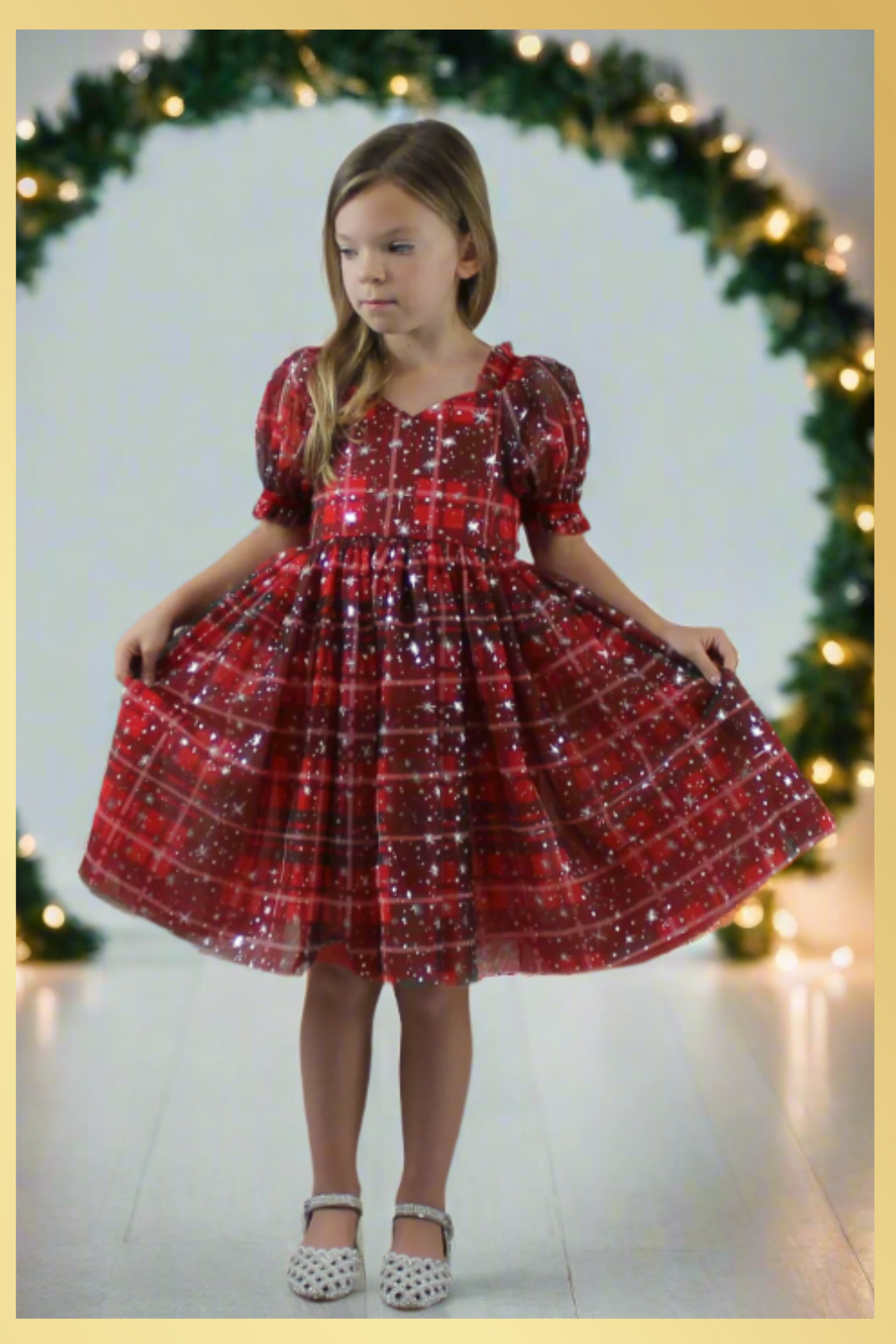 Girls red and green plaid Christmas dress in a short sleeve sweetheart neckline and knee length style. For holiday parties and family photos. 