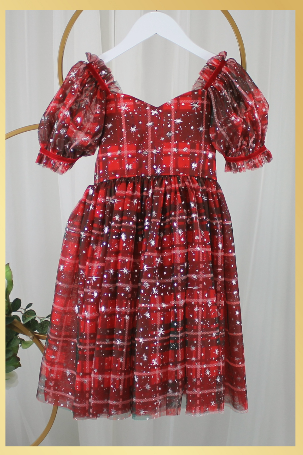 Girls red and green plaid Christmas dress in a short sleeve sweetheart neckline and knee length style. For holiday parties and family photos. 