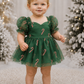 Green dress for girls with red and gold glitter candy canes, layered tulle skirt and classic sweetheart neckline.