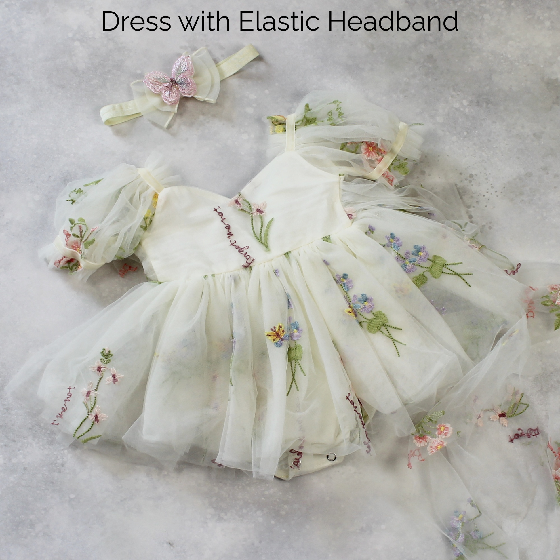 Fairy First birthday baby girls romper dress in ivory floral with wings. 