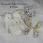 Fairy First birthday baby girls romper dress in ivory floral with wings. 