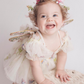 Wildflower first birthday baby girl dress in ivory embroidered flowers. 