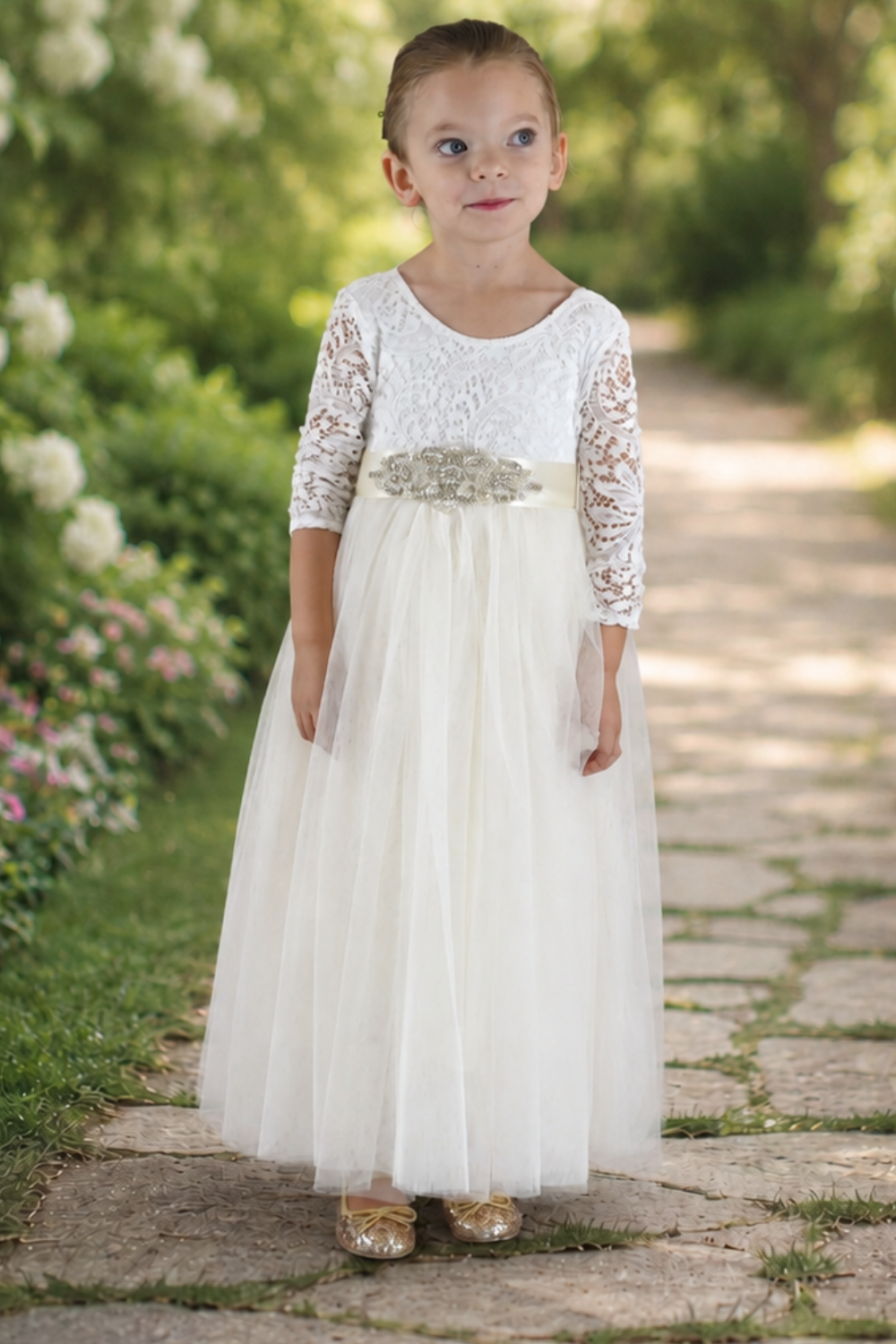 Lace Flower Girl Dress in ivory with long sleeves, soft tulle skirt and classic wedding style