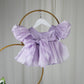 Lavender baby girl dress with puff sleeves and a bow. First birthday dress in Organza 