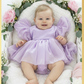 Baby girl dress in lavender with puffy short sleeves and built in romper style in Organza material
