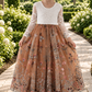 fall flower girl dress in burnt orange embroidered florals, sequins and tulle. Long sleeve white lace bodice and full length dress.  