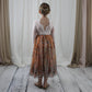Burnt Orange Floral flower girl dress in long sleeve white lace with full length tulle bottom. 