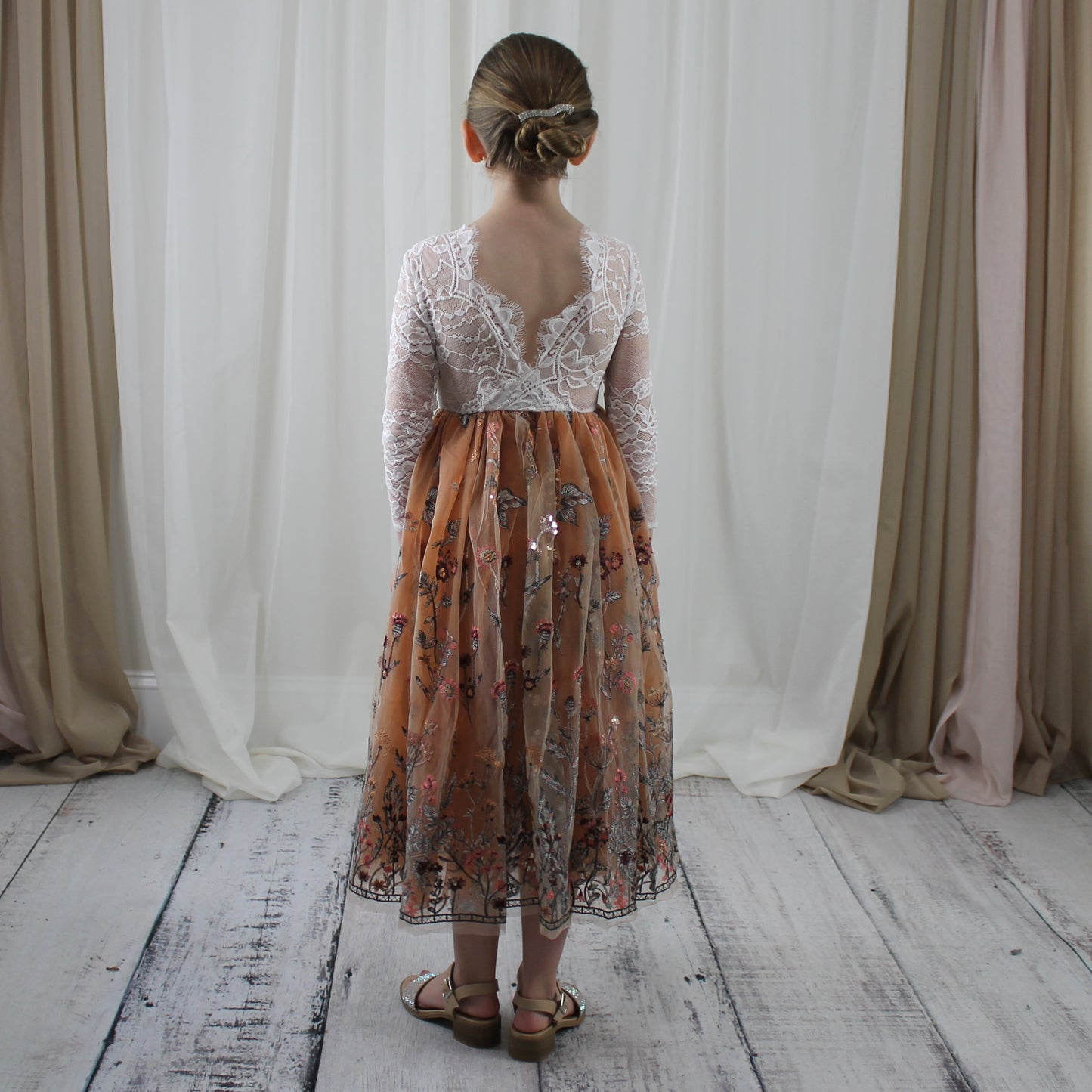 Burnt Orange Floral flower girl dress in long sleeve white lace with full length tulle bottom. 