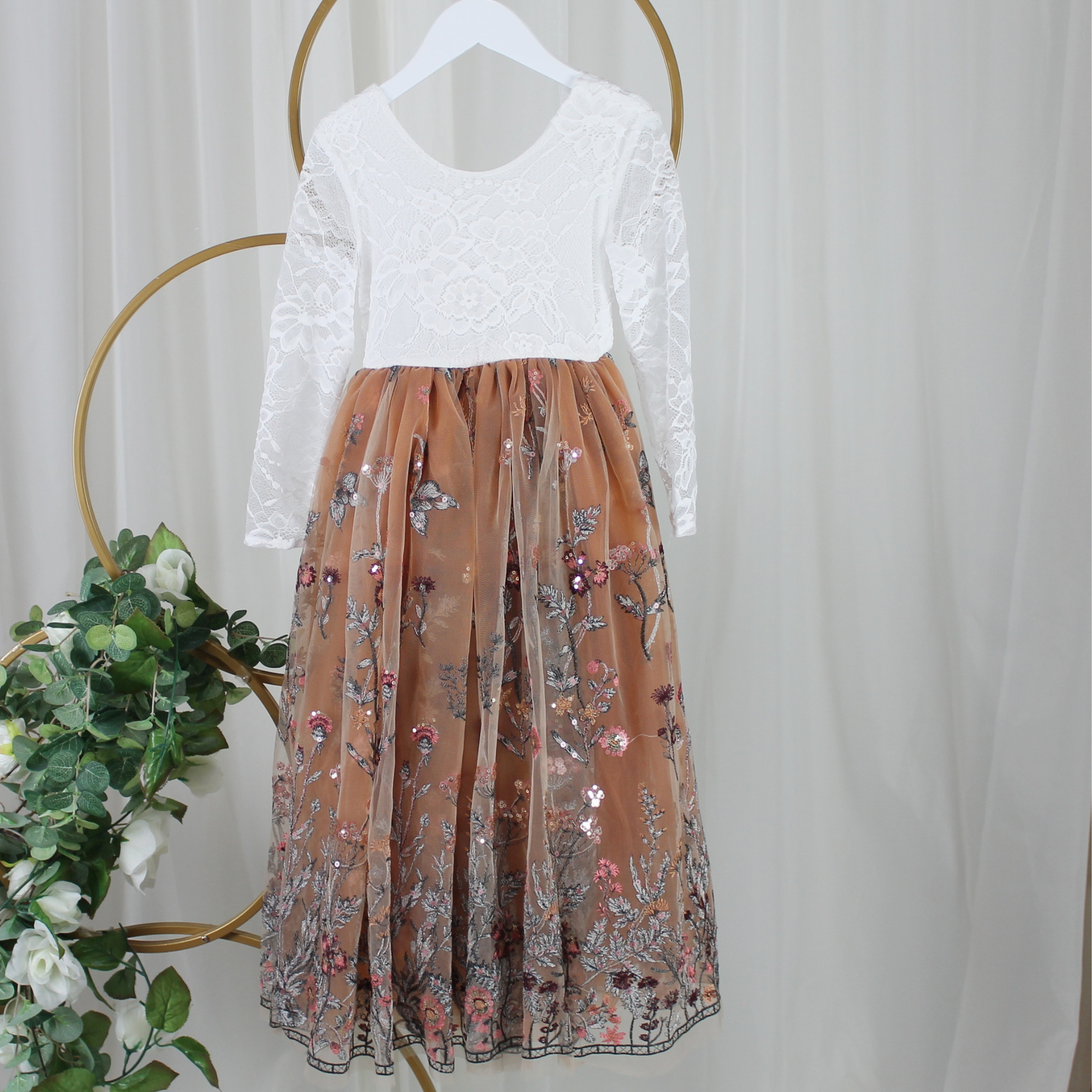 Burnt Orange Floral flower girl dress in long sleeve white lace with full length tulle bottom. 