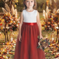 Flower girl dress in rust tulle with white lace sleeveless bodice.  In a full length styel