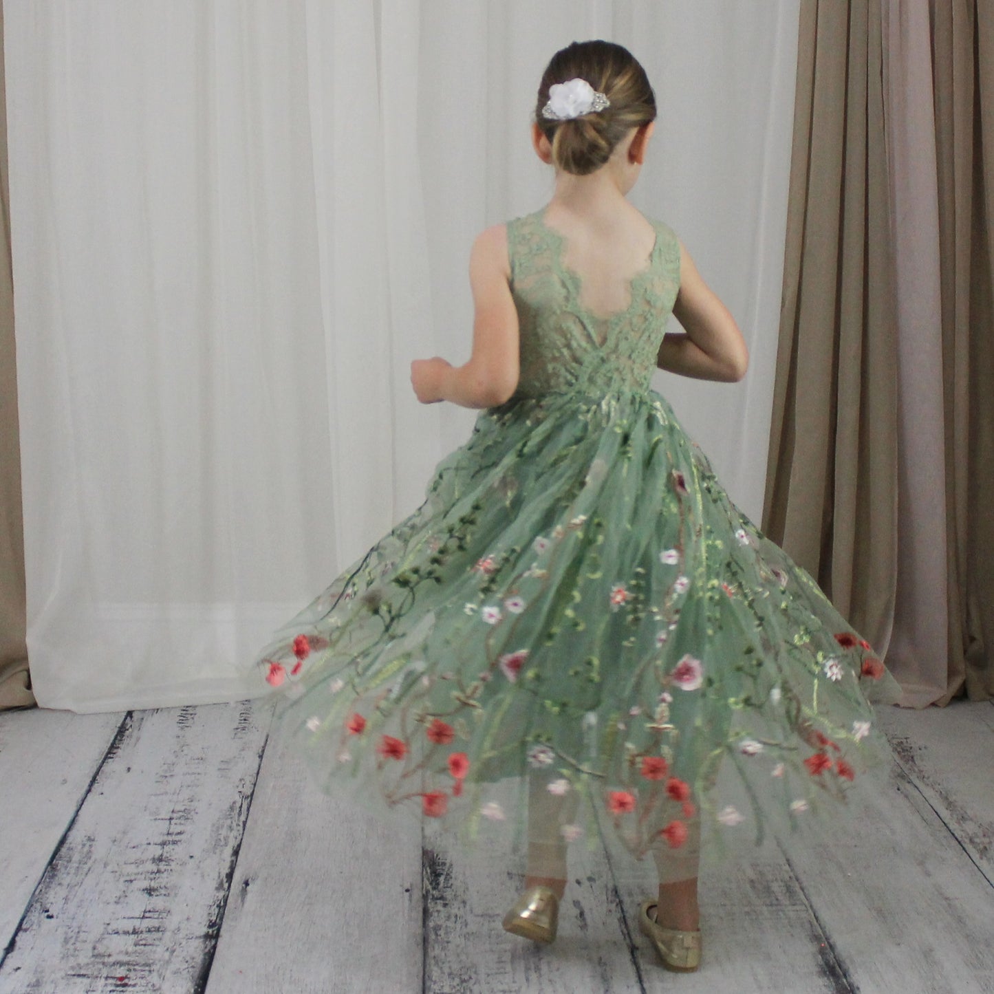 Floral flower girl dress in sage green lace and tulle. Full length dress that is sleeveless