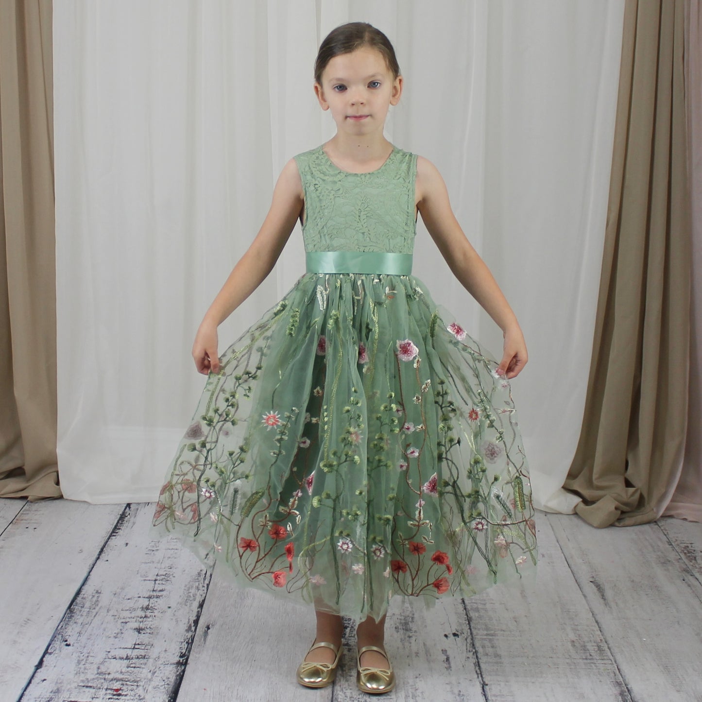 Floral flower girl dress in sage green lace and tulle. Full length dress that is sleeveless