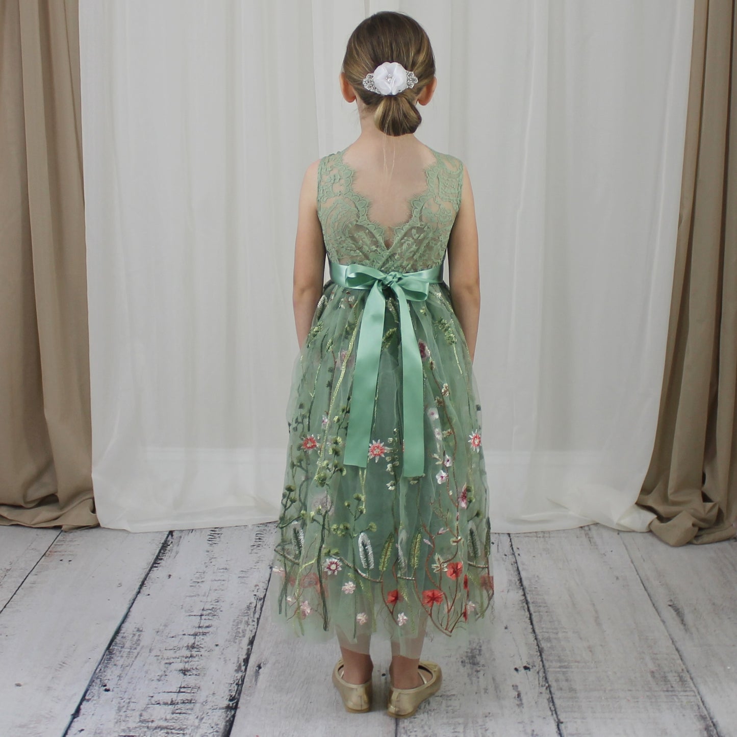 Floral flower girl dress in sage green lace and tulle. Full length dress that is sleeveless