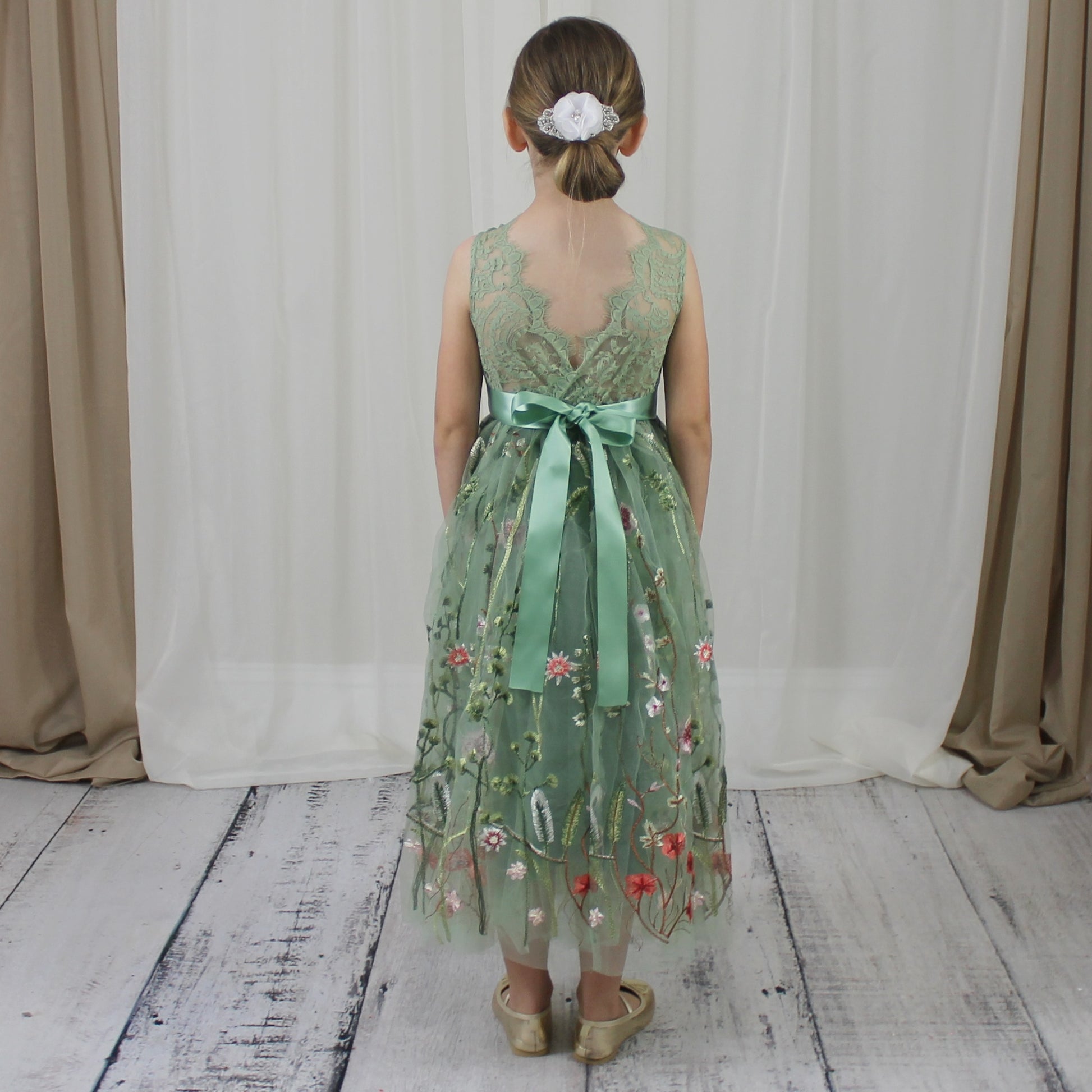 Floral flower girl dress in sage green lace and tulle. Full length dress that is sleeveless