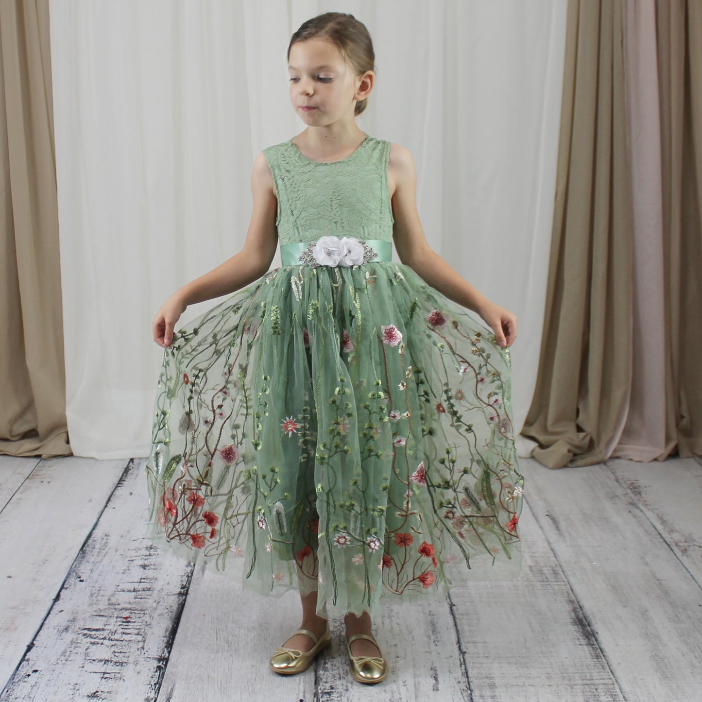 Floral flower girl dress in sage green lace and tulle. Full length dress that is sleeveless