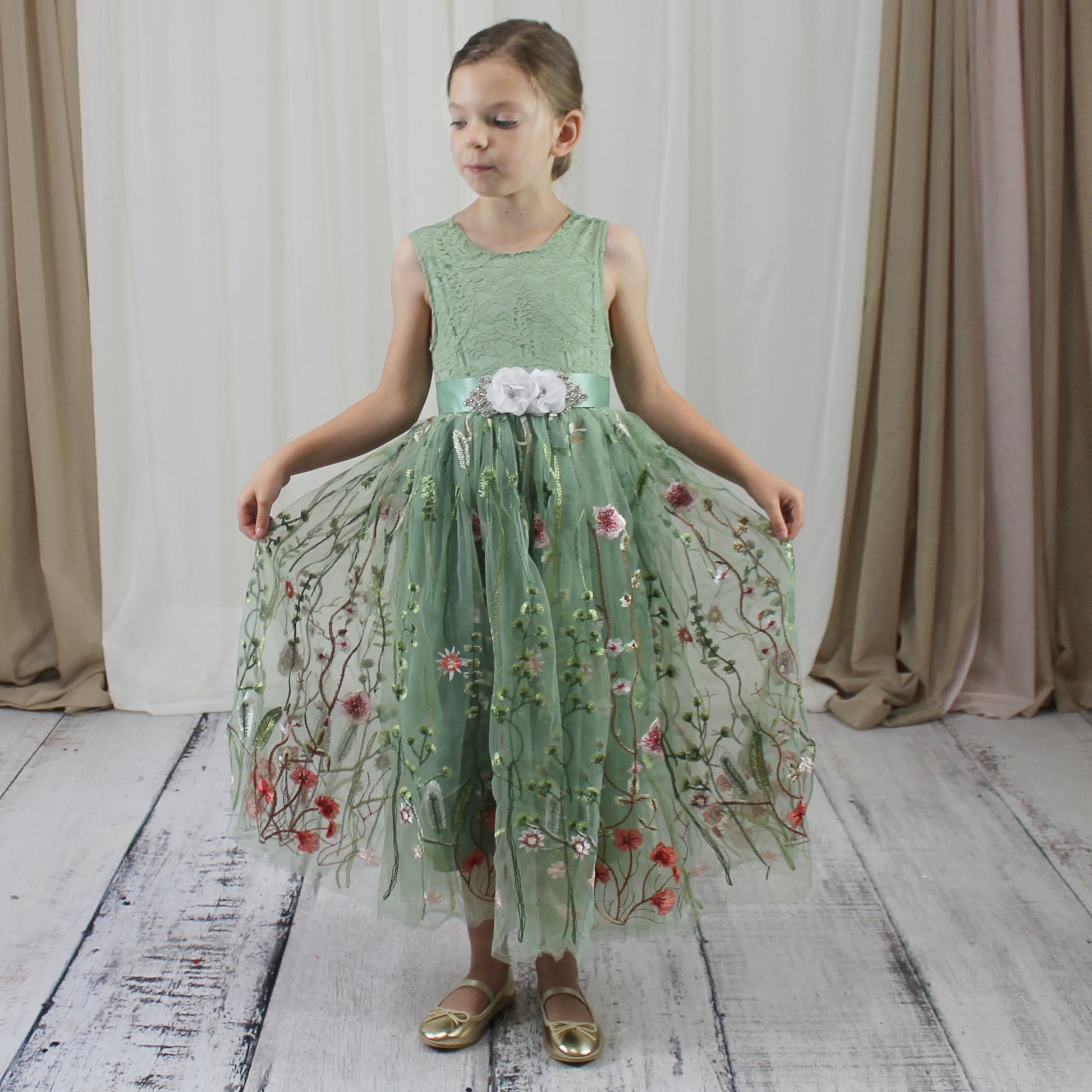 Floral flower girl dress in sage green lace and tulle. Full length dress that is sleeveless