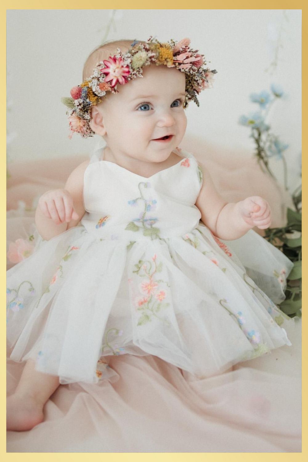 Baby girl first birthday fair dress in white florals.