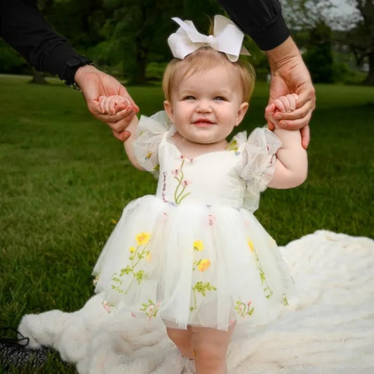 White floral flower girl dress for spring and summer weddings or other special occasions like birthdays and holidays. 