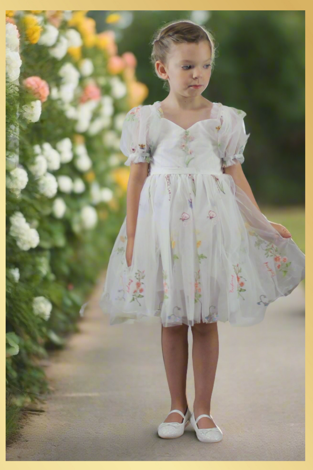 White floral flower girl dress for spring and summer weddings or other special occasions like birthdays and holidays. 