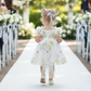 White floral flower girl dress for spring and summer weddings or other special occasions like birthdays and holidays. 