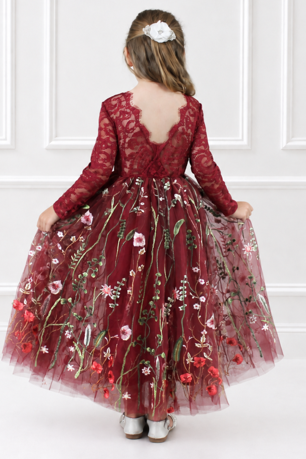 fall flower girl dress in embroidered floral burgundy tulle. Long lace sleeves and a full length style.