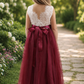 Flower girl dress in burgundy tulle and white lace sleeveless style. 