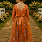 burnt orange floral flower girl dress in floral tulle and lace. 