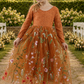 burnt orange floral flower girl dress in floral tulle and lace. 