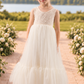 Flower girl dress in ivory lace and tulle.