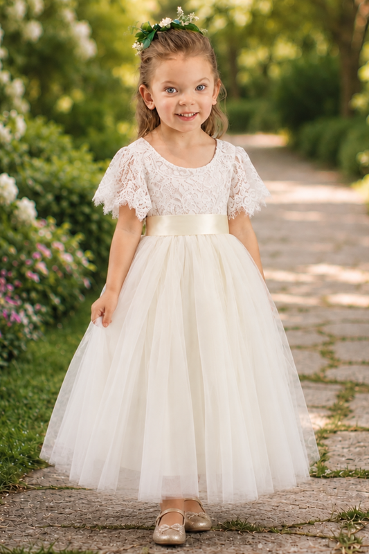 flower girl dress in ivory tulle and white lace short sleeves. 