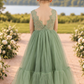 flower girl dress in sage green tulle and lace with a full mermaid style skirt. 