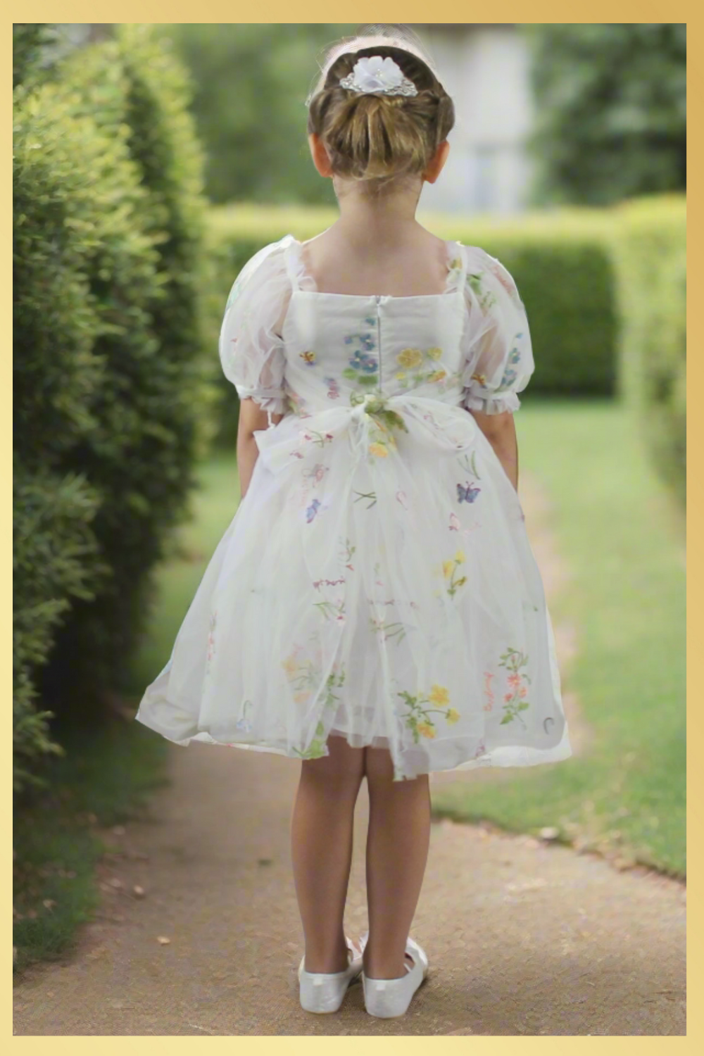 White floral flower girl dress for spring and summer weddings or other special occasions like birthdays and holidays. 