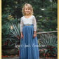 Dusty blue flower girl dress in long tulle with long sleeves in white lace. 